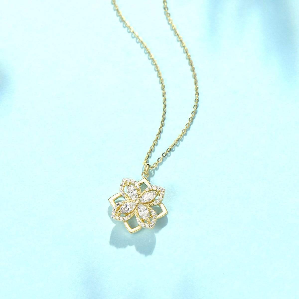 Four leaf clover rotating necklace