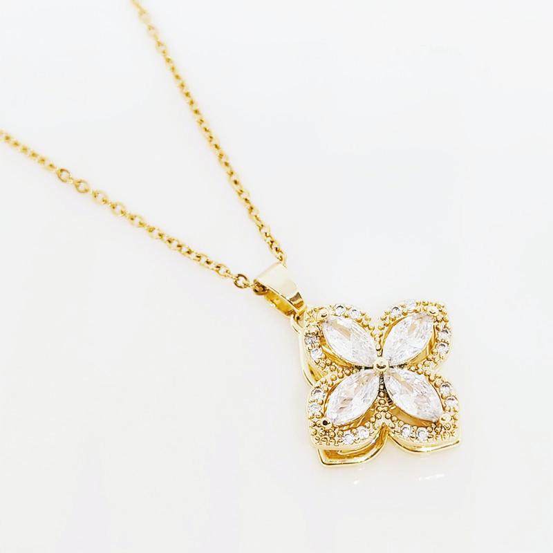 four leaf clover rotating necklace